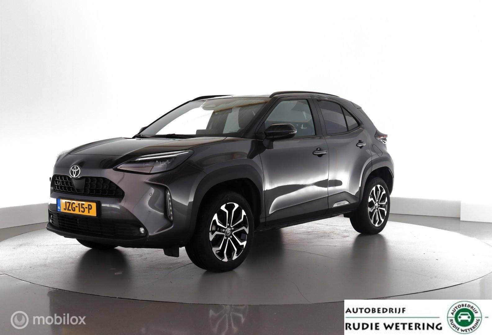Toyota Yaris Cross 1.5 Hybrid 115 led|nav|cam|acc|stoelverw., Auto's, Toyota, Stof, Gebruikt, 116 pk, 23 km/l