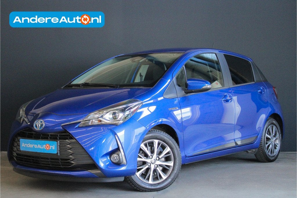 Toyota Yaris 1.5 Hybrid Y20 |stoelverwarming|navigatie|parke, Gebruikt, Zwart, 4 cilinders, Blauw