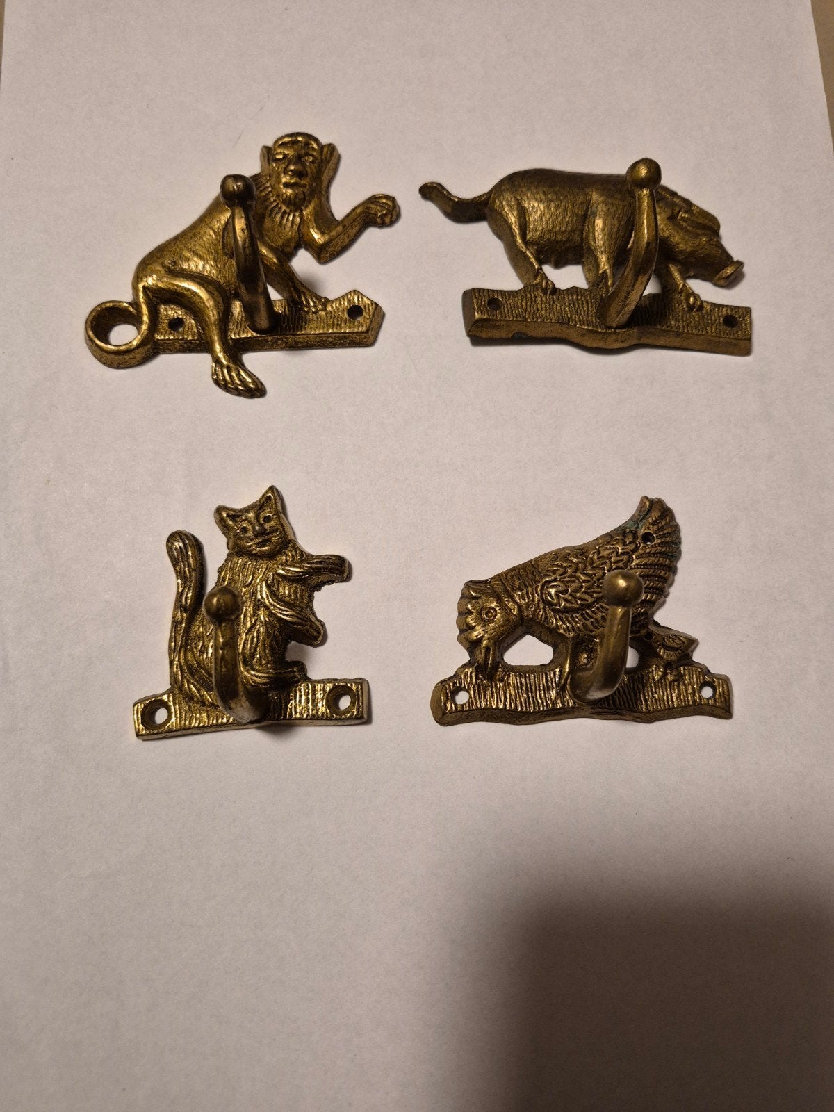 Unieke set van 4 vintage messing kapstokhaken (Dieren), Gebruikt, Wandhaken, Ophalen of Verzenden, Minder dan 100 cm