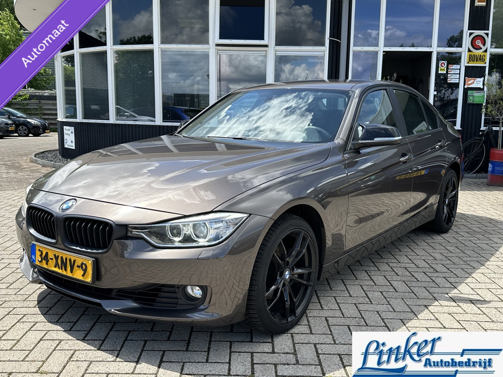 BMW 3-serie 320i High Executive - NL-AUTO AUTOMAAT PDC ACHTE, Auto's, BMW, Euro 5, Gebruikt, Zwart, 4 cilinders