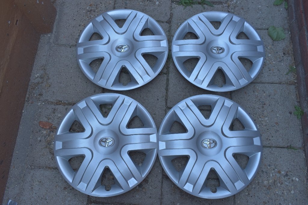Set van 4 originele wieldoppen Toyota Avensis 16 inch, Auto diversen, Wieldoppen, Ophalen of Verzenden, Gebruikt