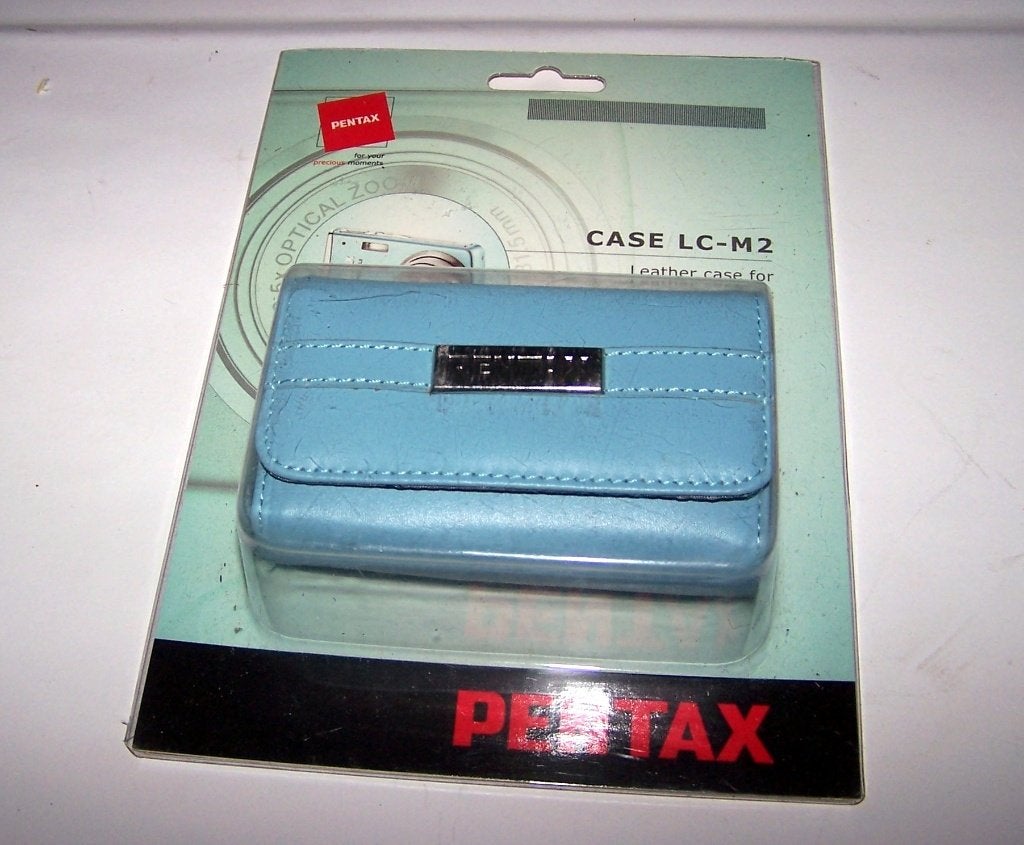 Prachtig leren lichtblauw Pentax cameratasje. Nieuw/ovp., Lowepro, Nieuw, Ophalen of Verzenden, Waterafstotend