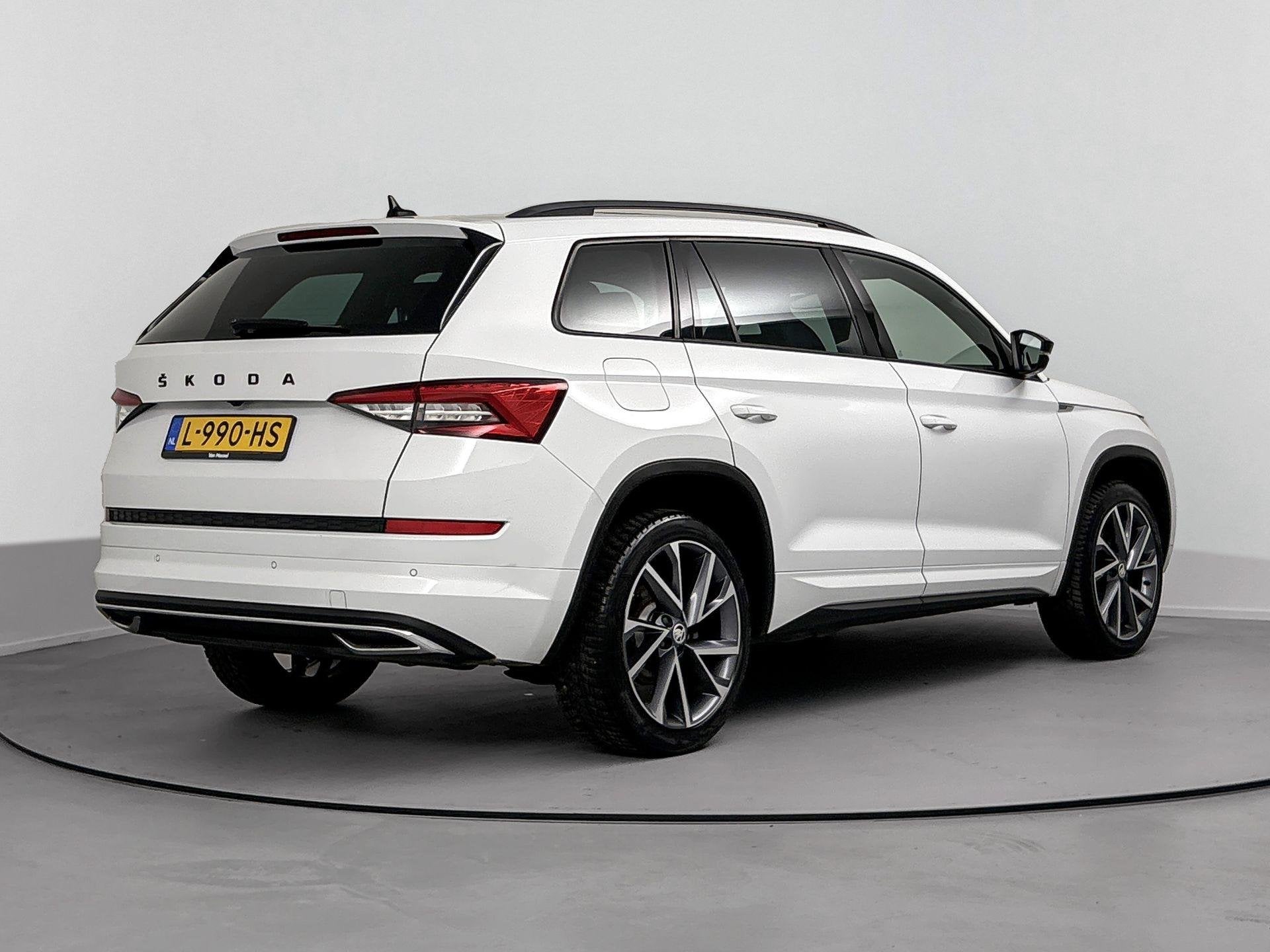Skoda Kodiaq 1.5 TSI Sportline Business Airco | Achteruitrij, Auto's, 4 cilinders, Wit, Origineel Nederlands, Bedrijf