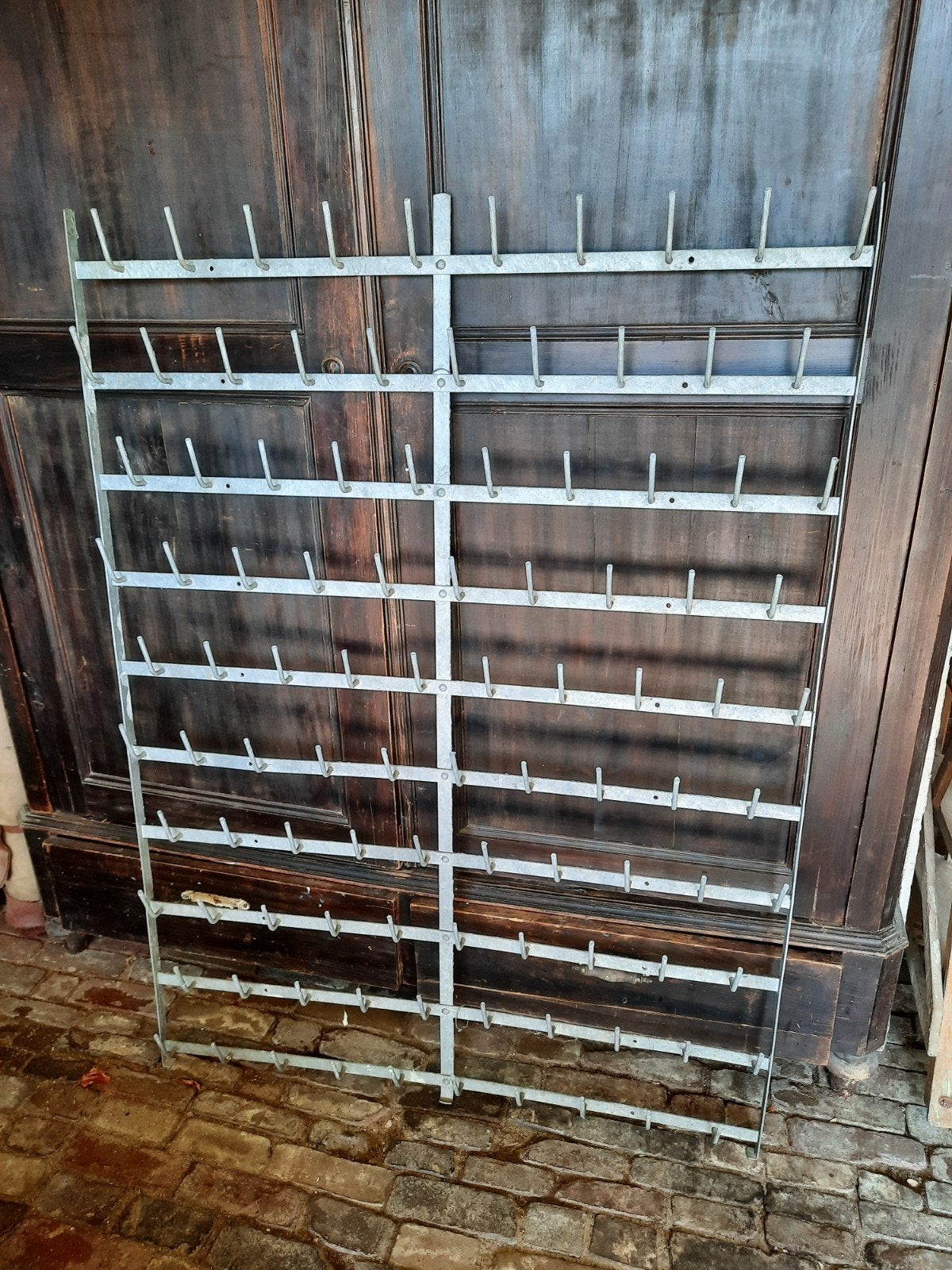 IJzeren rek pinnenrek flessenrek wandrek brocante, Ophalen