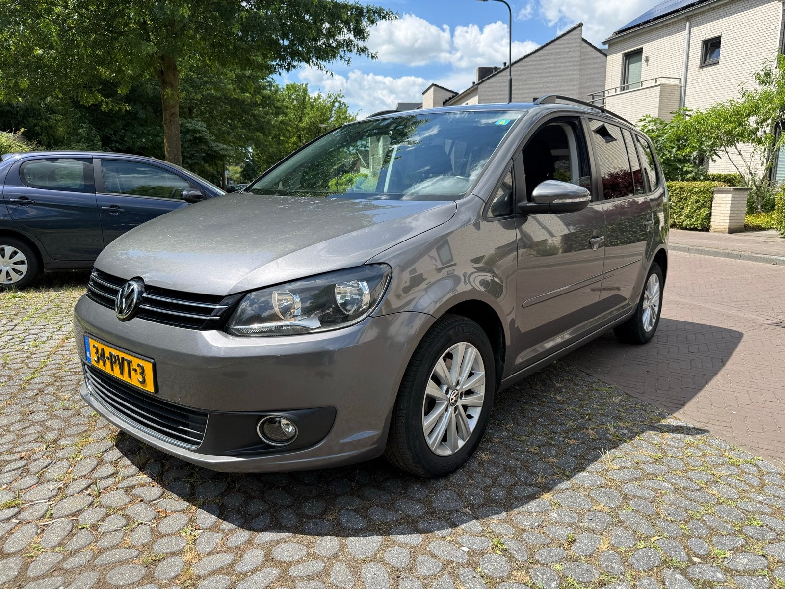 Volkswagen Touran 1.4 TSI 103KW Dsg7  2011 Grijs, Auto's, Volkswagen, Euro 5, 4 cilinders, 1436 kg, Origineel Nederlands