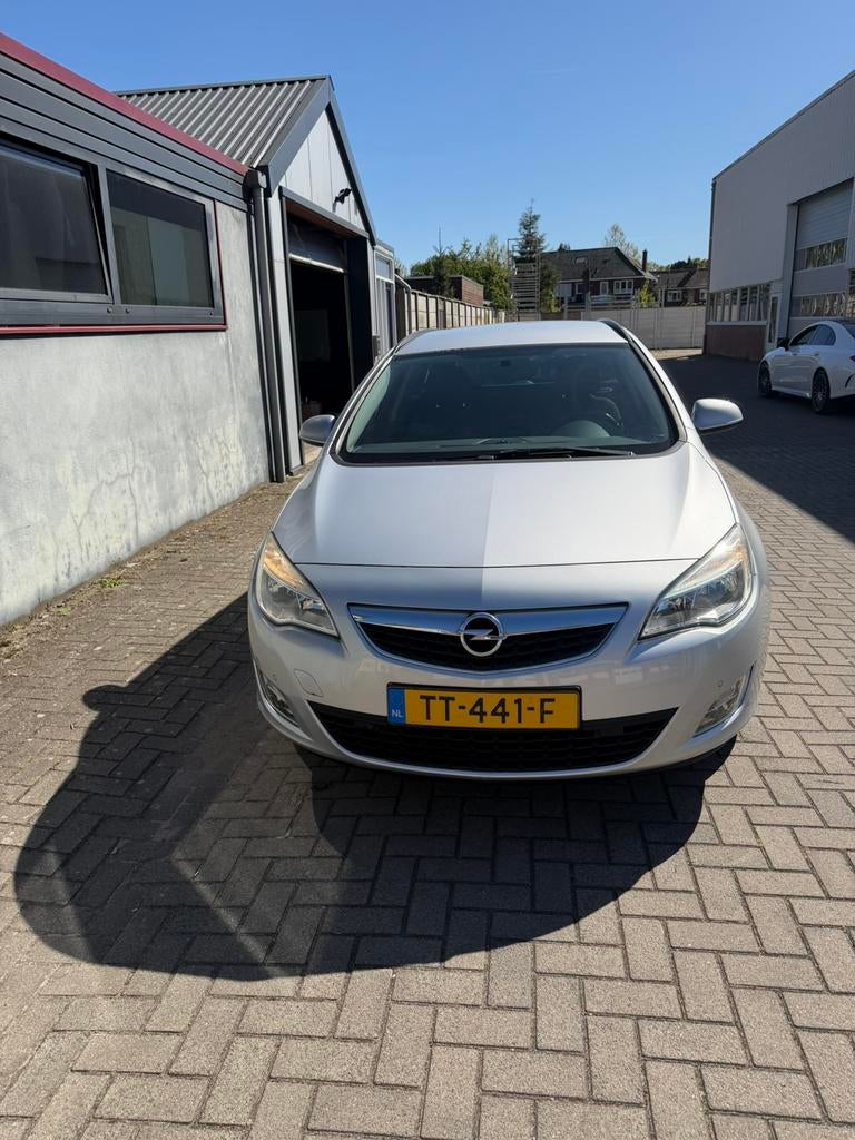 Opel Astra 1.4 Turbo 103KW ST 2011 Grijs, Auto's, Opel, Voorwielaandrijving, Stof, Zwart, 4 cilinders
