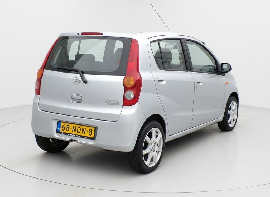 Daihatsu Cuore 1.0 Class|Airco|Elektrische ramen|Radio, Auto's, Daihatsu, Voorwielaandrijving, Stof, 18 €/maand, 4 stoelen