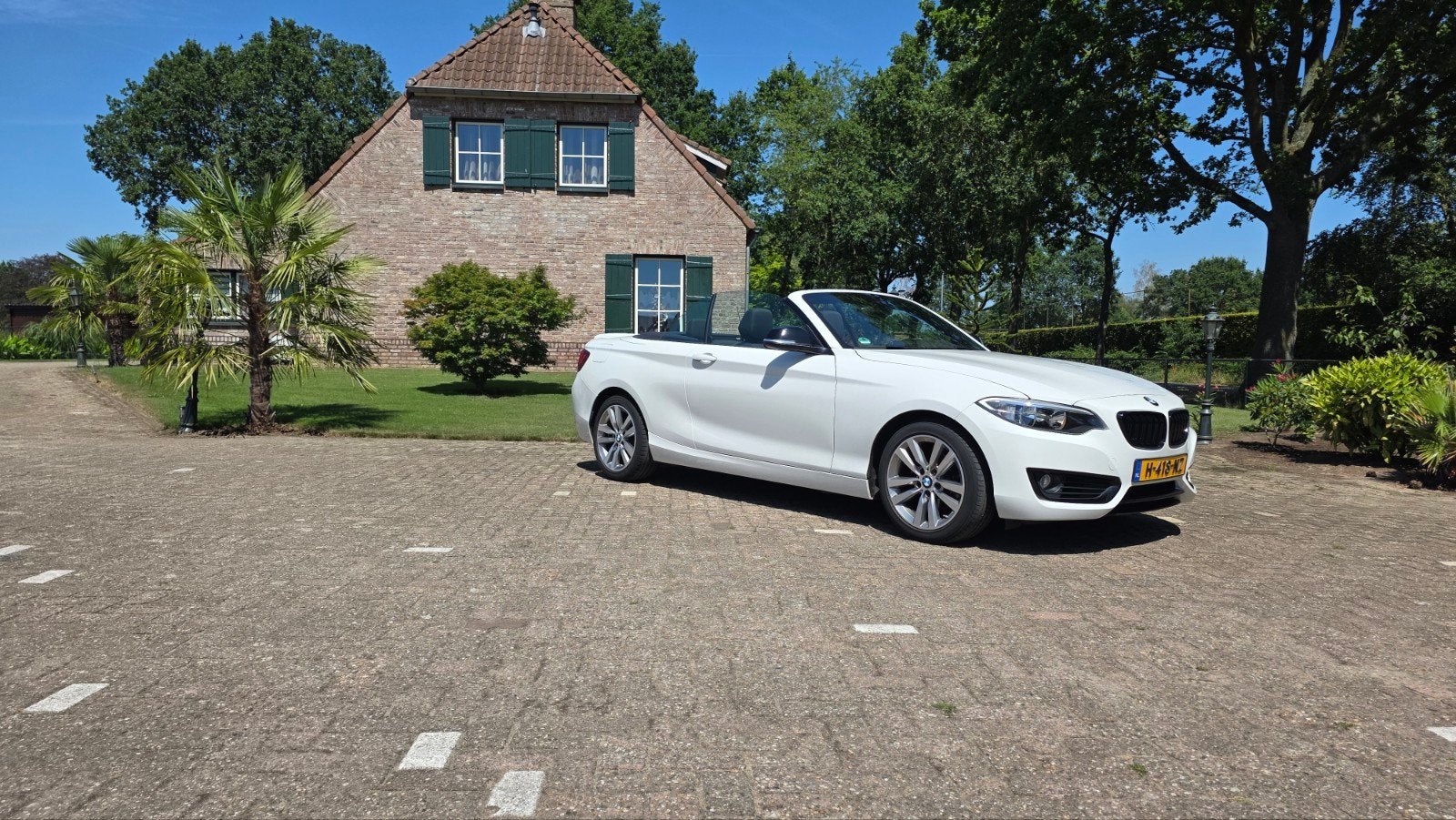 BMW 2-Serie 1.5 218IA 100KW Cabrio Aut8 2015 Wit, Automaat, Cabriolet, 4 stoelen, Wit