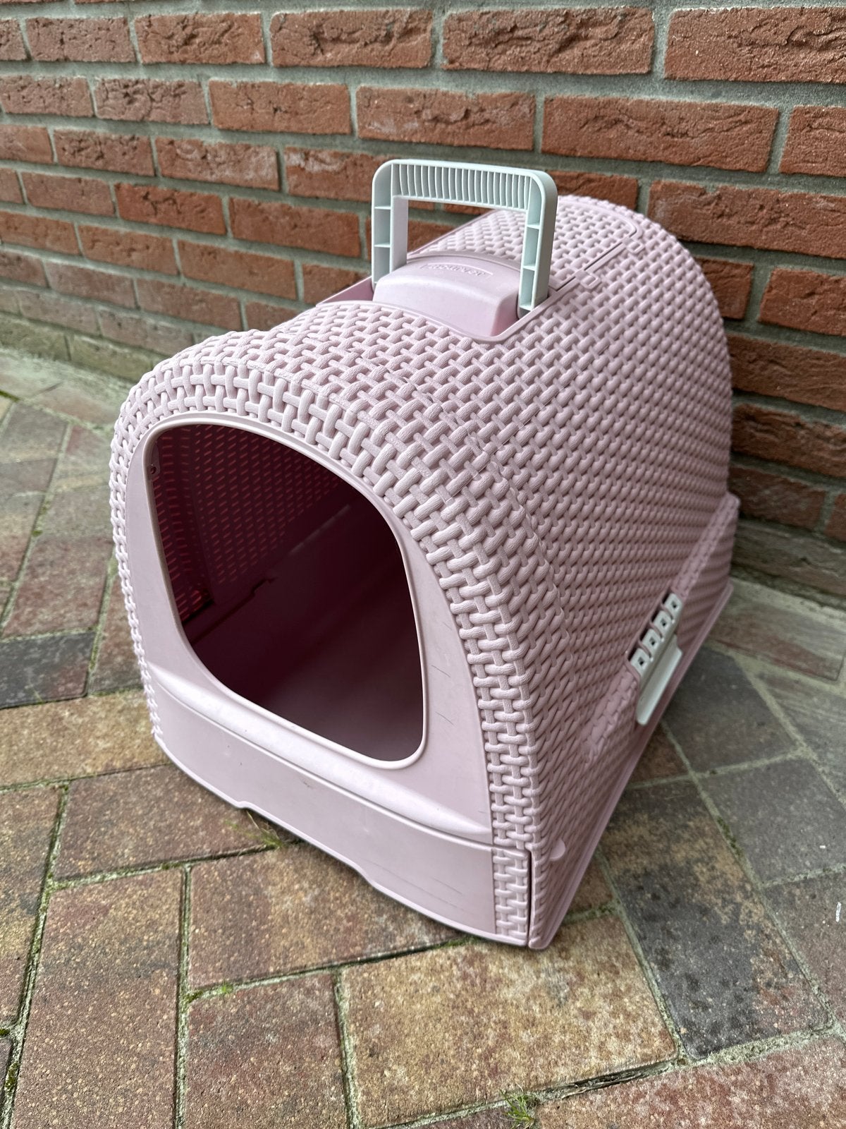Roze kattenbak, Ophalen, Gebruikt
