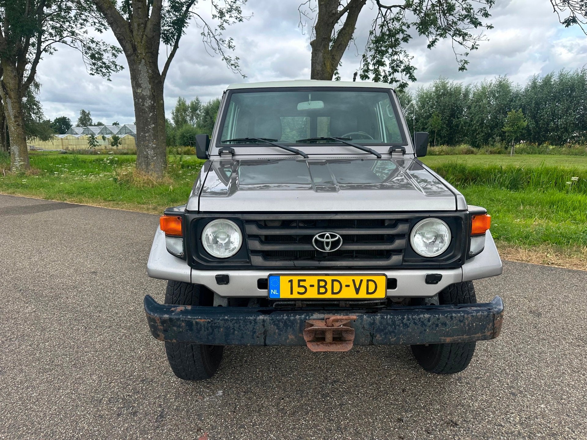 Toyota LandCruiser 70 4.2 LX Blind Van FRP|unieke km|nw apk, Auto's, Bestelauto's, Stof, Gebruikt, Zwart, 4164 cc