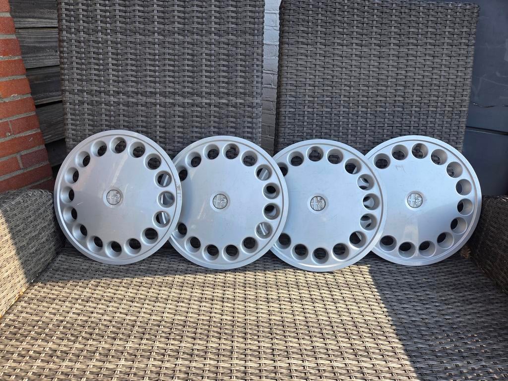 Alfa Romeo wieldoppen set van 4, Ophalen of Verzenden, Gebruikt