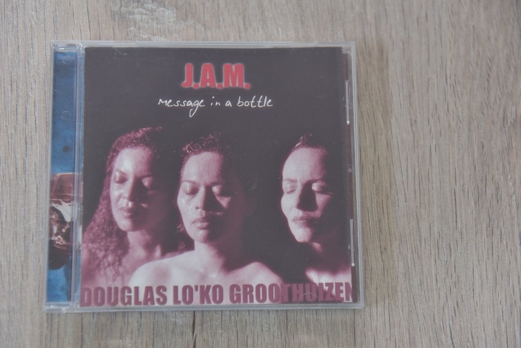 DOUGLAS - LO"KO - GROOTHUIZEN --- J.A.M. Message in a Bottle, Cd's en Dvd's, Inclusief boekje, Zo goed als nieuw, Album, Verzenden