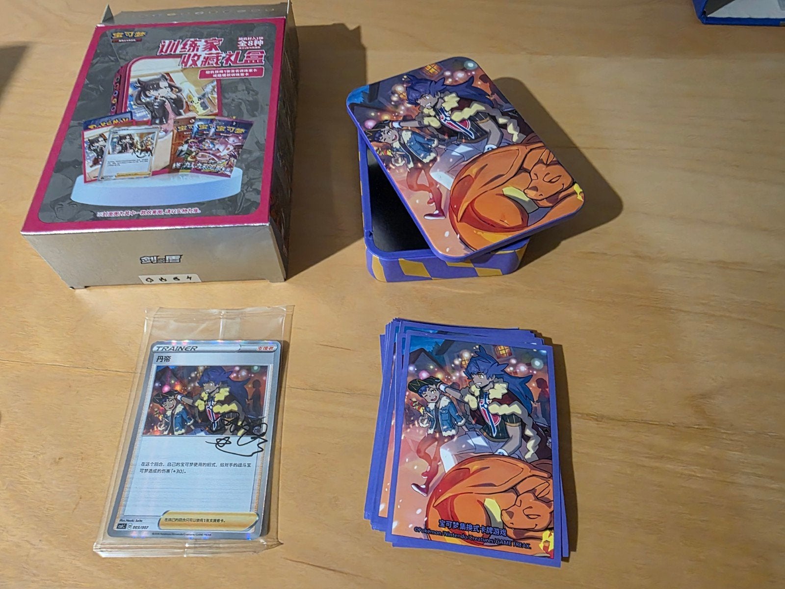 pokemon trainer tin collection leon / charizard, Ophalen of Verzenden, Nieuw