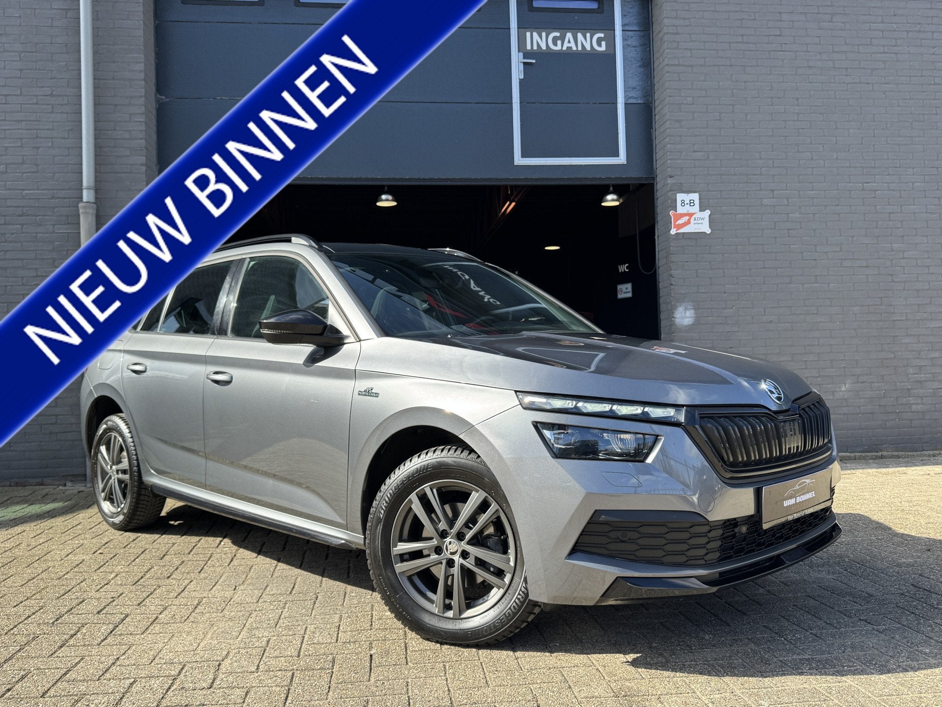 Skoda Kamiq 1.0 TSI Monte Carlo ClimaC.CruiseC.Navi.Panodak., Auto's, Voorwielaandrijving, Stof, Gebruikt, Zwart