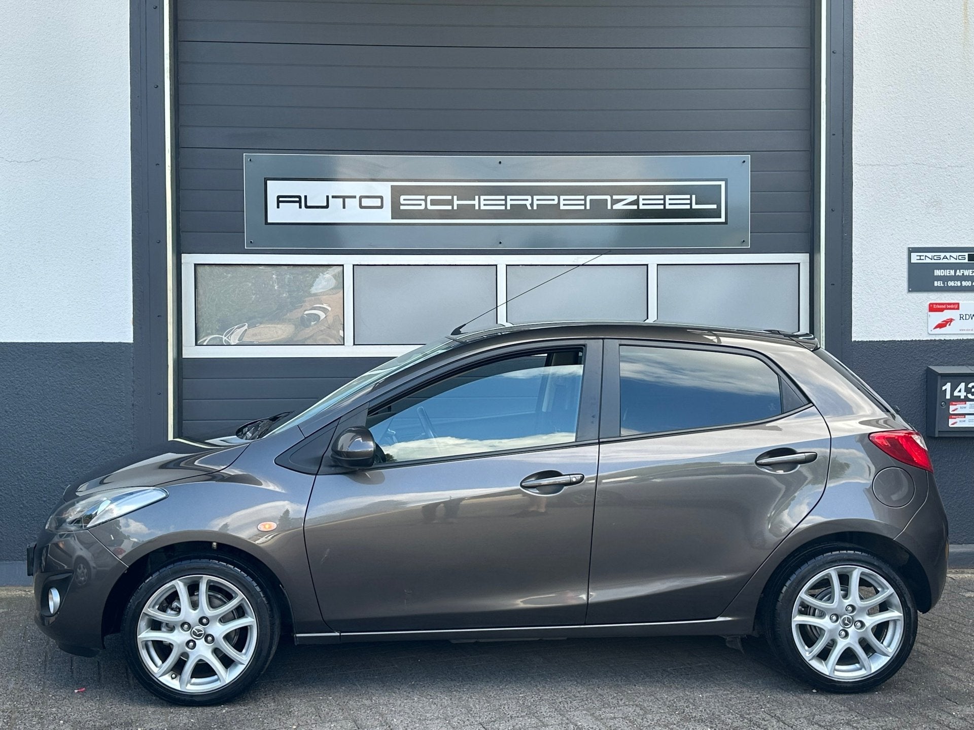 Mazda 2 1.3 Silver Edition | AIRCO | NAVI | BLUETOOTH | PARK, Auto's, Mazda, Euro 5, Stof, Gebruikt, 4 cilinders