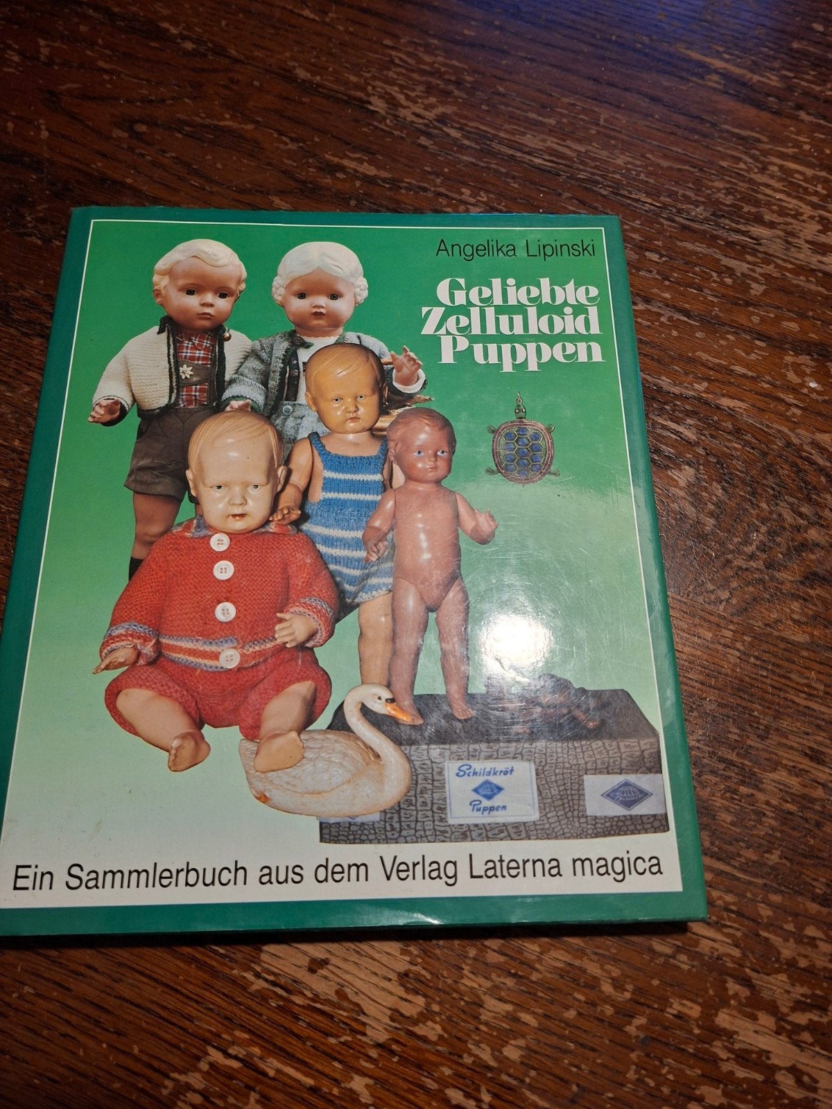 poppenboek, Ophalen, Zo goed als nieuw