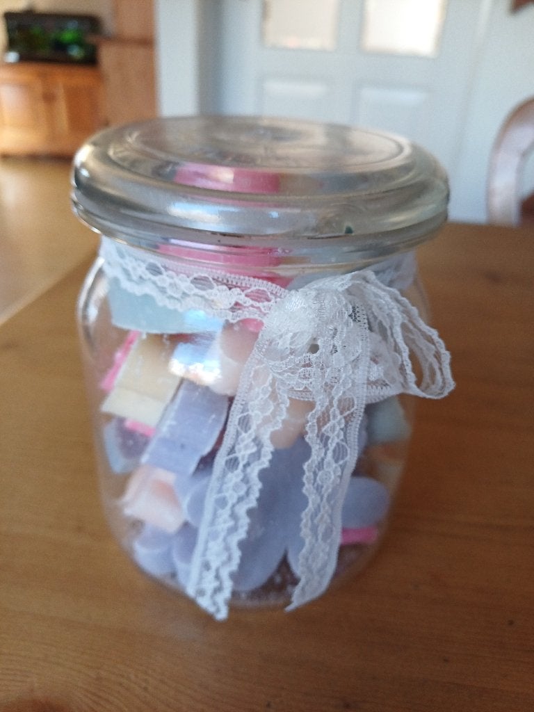 weckpot met figuurzeepjes, Ophalen