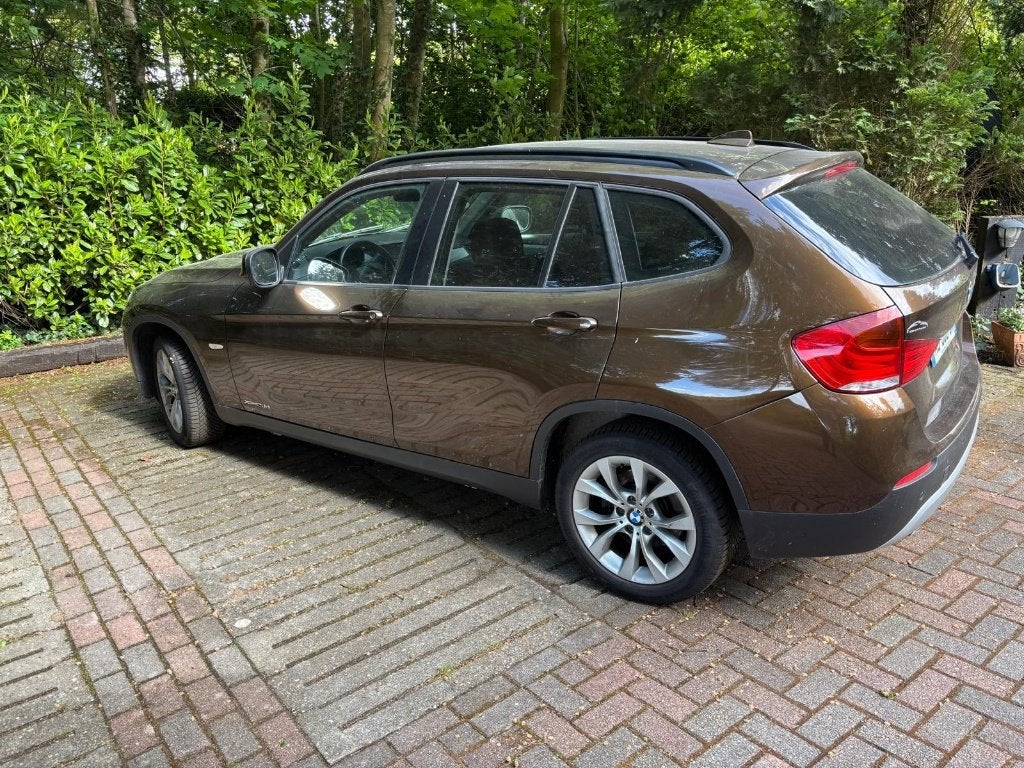 BMW X1 (E84) xDrive20d 177pk Confort — Automaat, Euro 5, 1995 cc, 4 cilinders, Bruin