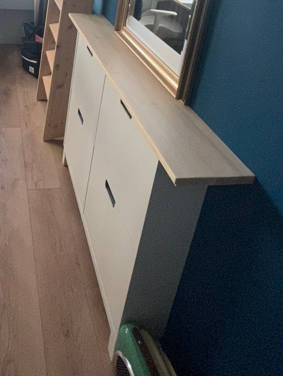 IKEA shoe storage with wood plank