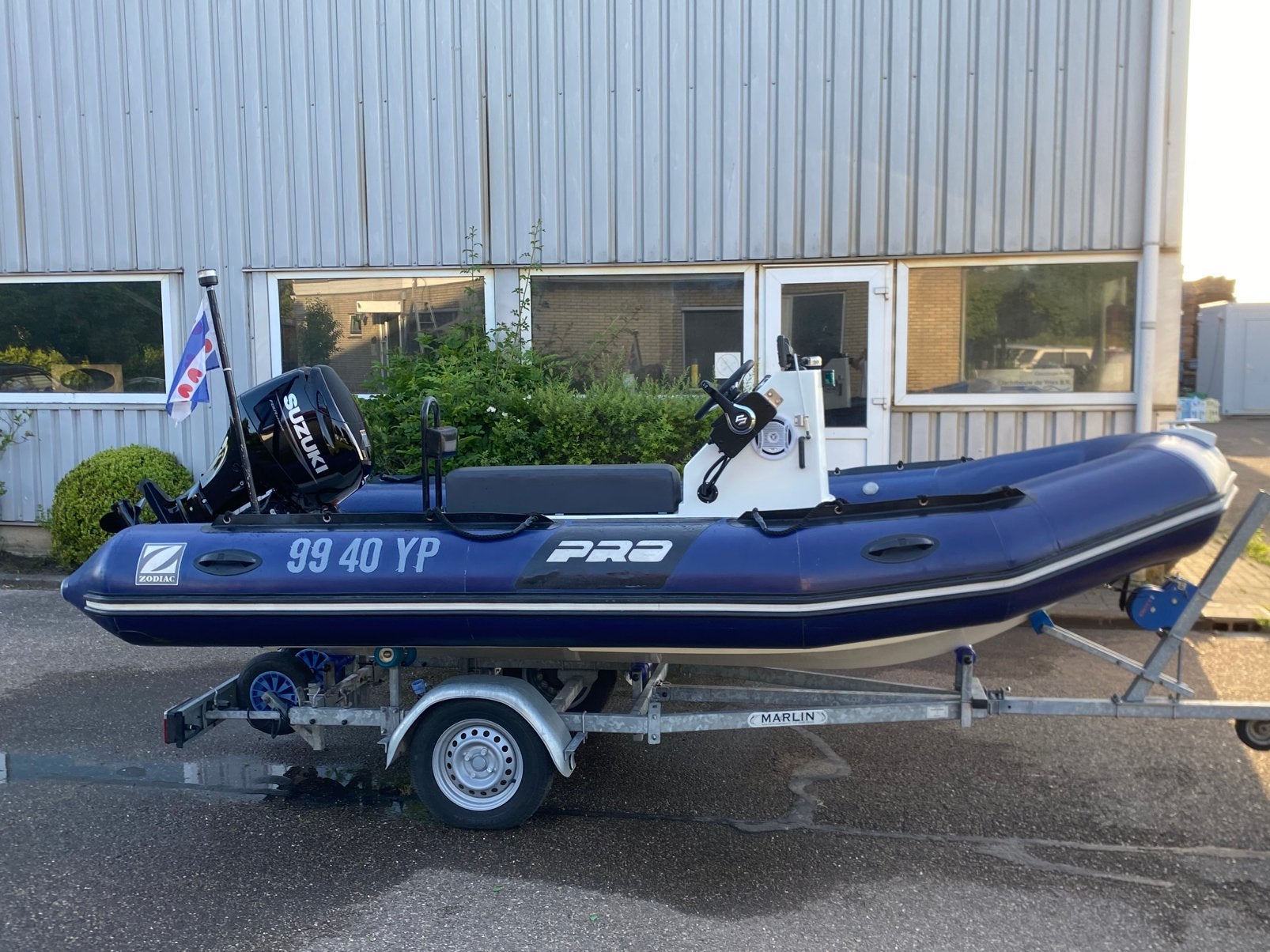 Zodiac pro 500 met bijna nieuwe Sukuzi 60 pk met trailer, Watersport en Boten, Rubberboten, 60 pk, Binnenboordmotor, Ophalen of Verzenden