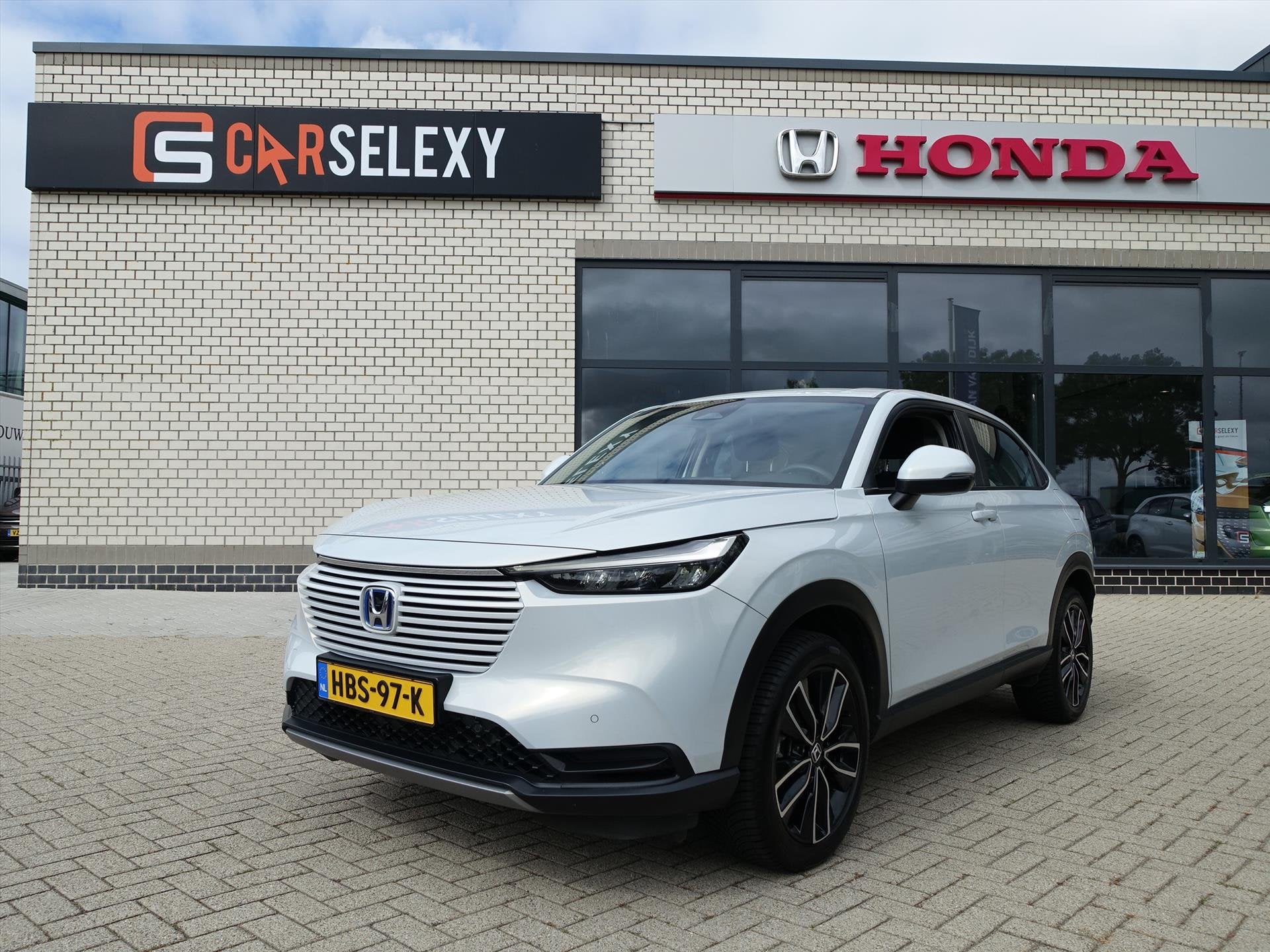 HONDA HR-V 1.5 i-MMD 131pk CVT Elegance, Auto's, Automaat, Stof, Bedrijf, Hybride Elektrisch/Benzine