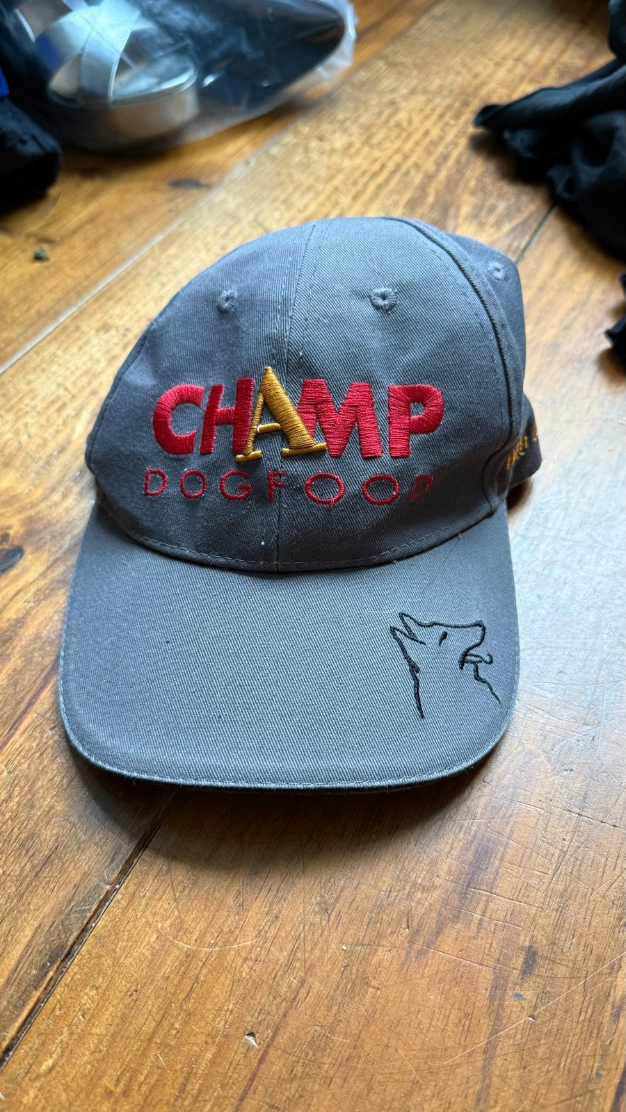 Grijze pet met 'Champ Dogfood' logo en hondenafbeelding, Ophalen of Verzenden, Gedragen, One size fits all, Pet