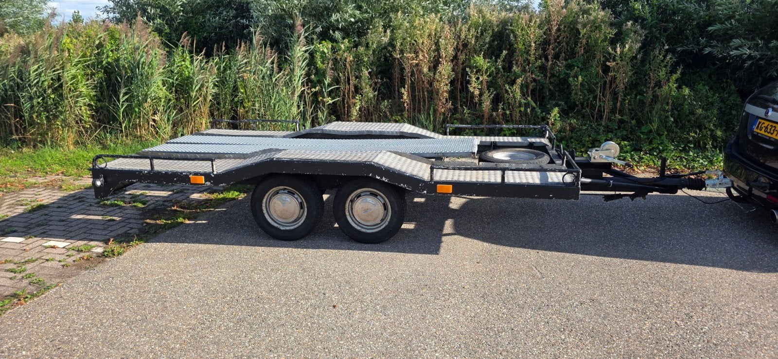 Autoambulance compleet met sjorbanden en eigen kenteken, Ophalen