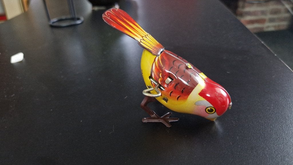 Pikkend vogeltje van blik, Antiek en Kunst, Antiek | Speelgoed, Ophalen of Verzenden