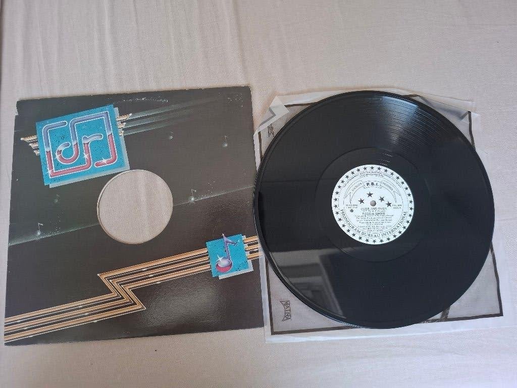 Reggie Simms/ Over and over canada 1982 disco 12 inch, Originele persing, Ophalen of Verzenden, Zo goed als nieuw, 12 inch