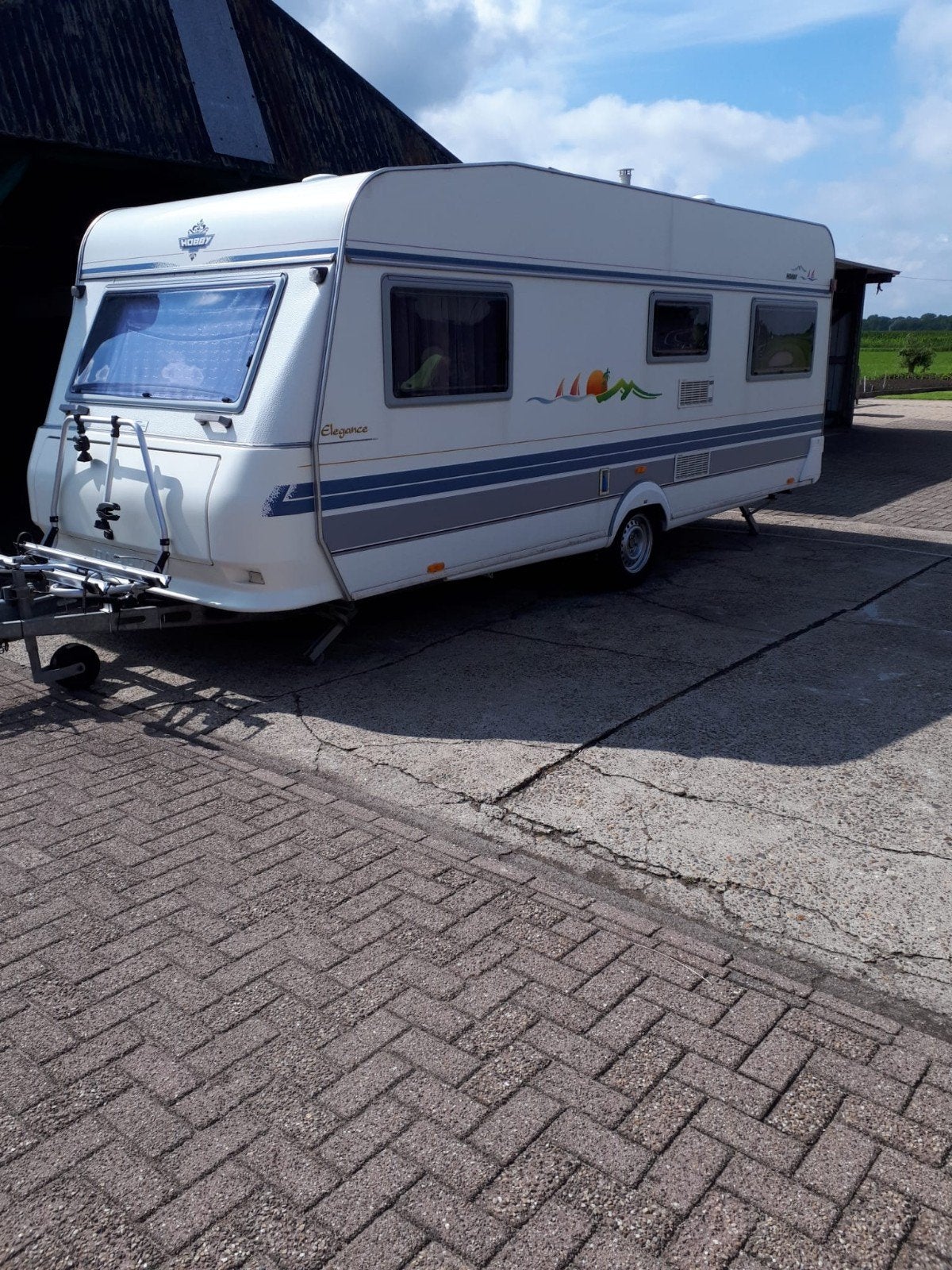 Hobby 535 UB Elegance Caravan met Voortent en Fietsenrek, Rondzit, Hobby, Dwarsbed, Particulier