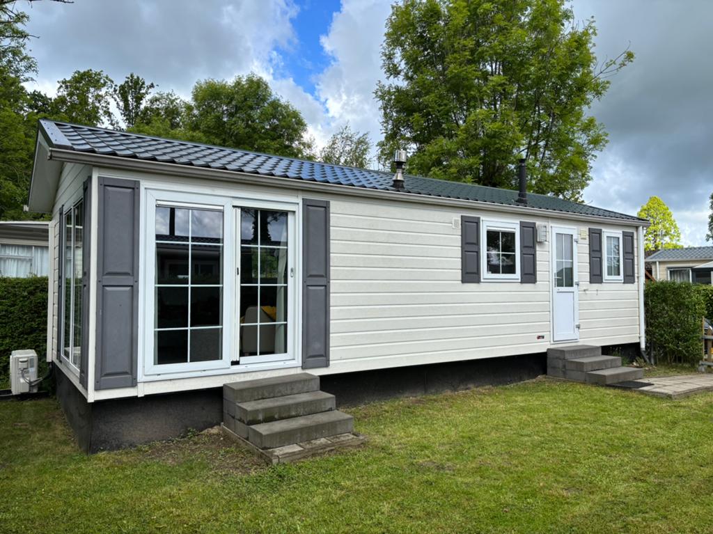 Te koop: mooi instapklaar 4 pers. chalet, Caravans en Kamperen, Stacaravans, Tot en met 4