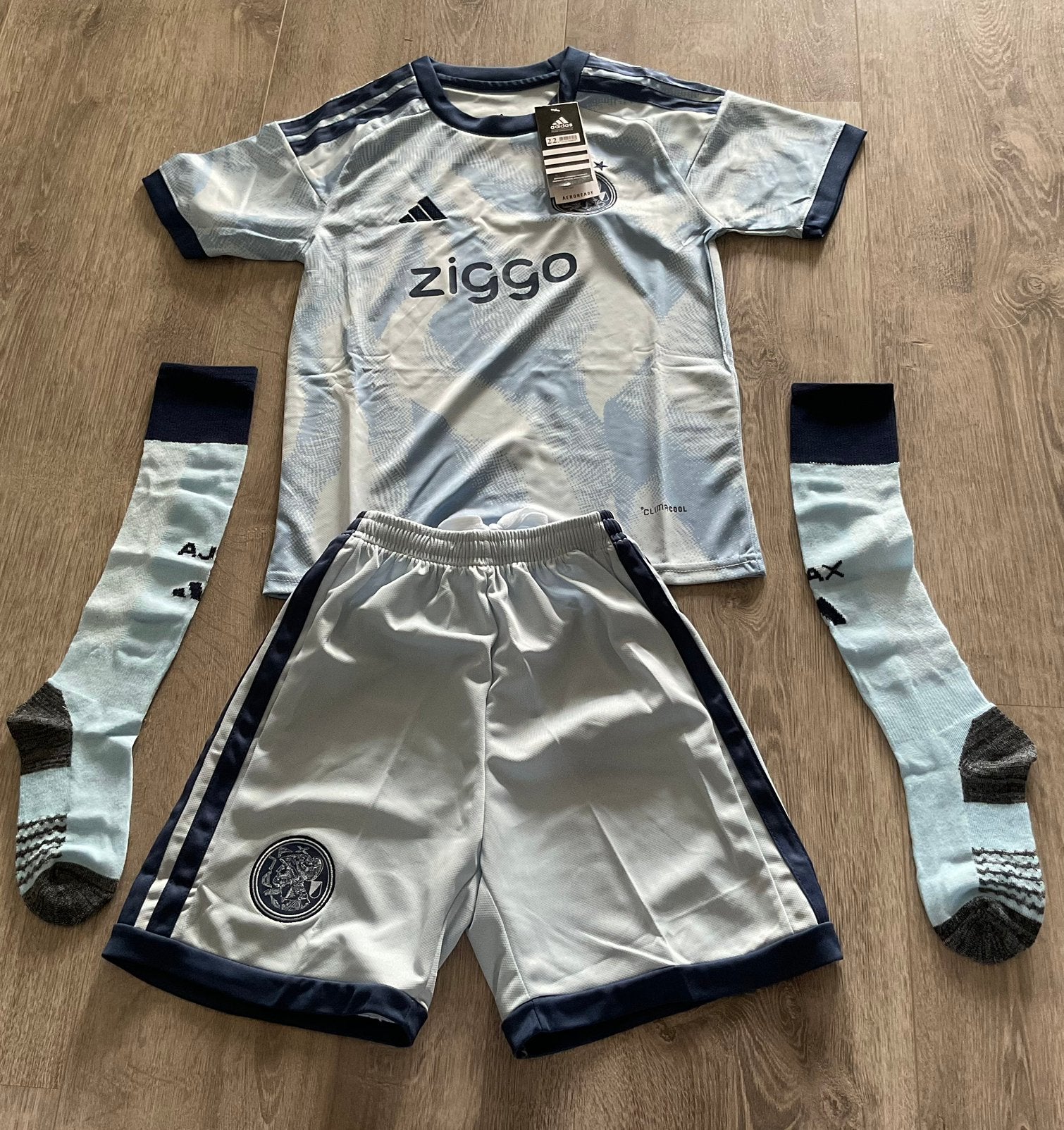 Ajax tenue nieuw maat 122, Maat XS of kleiner, Ophalen of Verzenden, Nieuw, Set