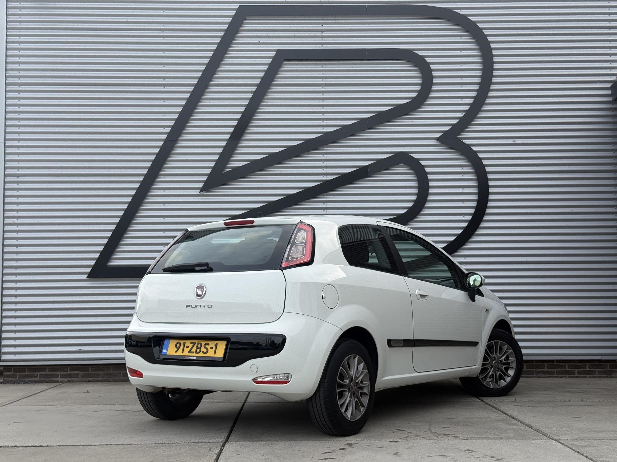 Fiat Punto Evo 1.2 Pop 2e Eigenaar|Airco|Cruise|Elektr. Rame, Auto's, Euro 5, Stof, 1242 cc, 4 cilinders