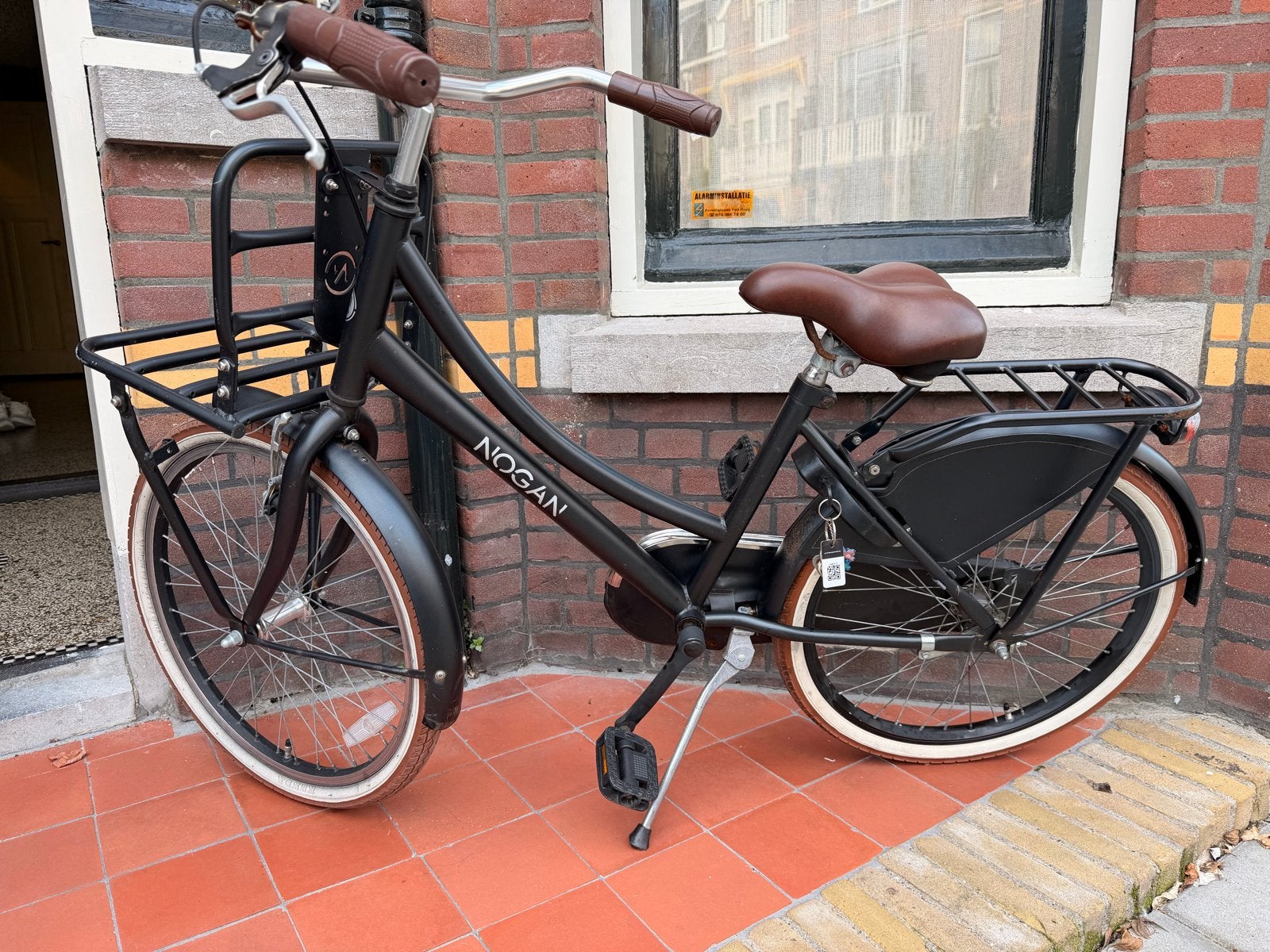 Nogan 22 inch kinderfiets met voordrager, Fietsen en Brommers, Ophalen, Gebruikt, Velgrem, 20 inch of meer