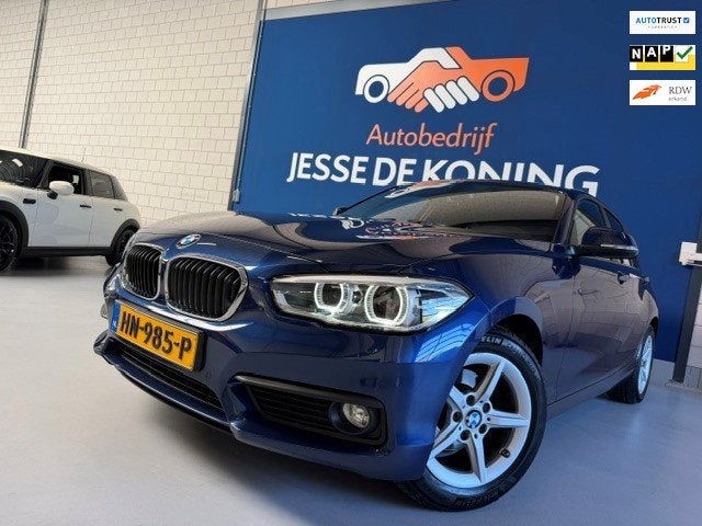 BMW 1-serie 118i EDE Corporate Lease Essential automaat / bj, Gebruikt, Blauw, Origineel Nederlands, Bedrijf