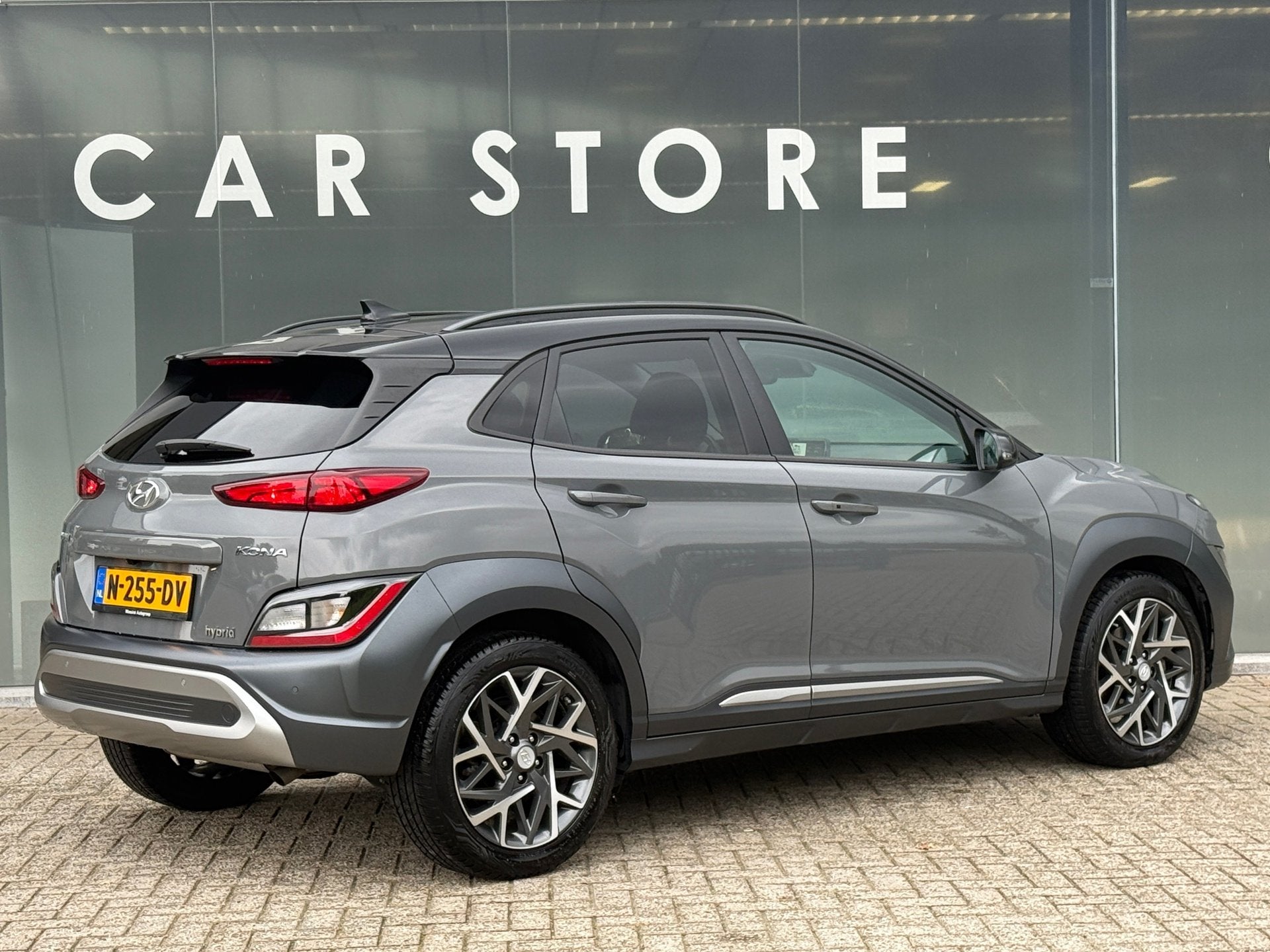 Hyundai Kona 1.6 GDI AUT HEV Fashion Navi|Carplay|Camera|HuD, Dealer onderhouden, Stof, Gebruikt, Origineel Nederlands