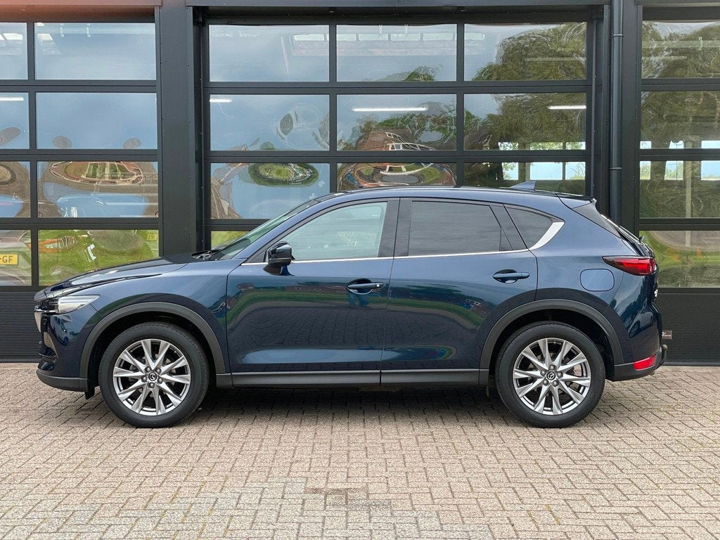 Mazda CX-5 2.5 4WD SkyActiv-G 194 Luxury, Auto's, Mazda, Gebruikt, 4 cilinders, 2000 kg, Blauw