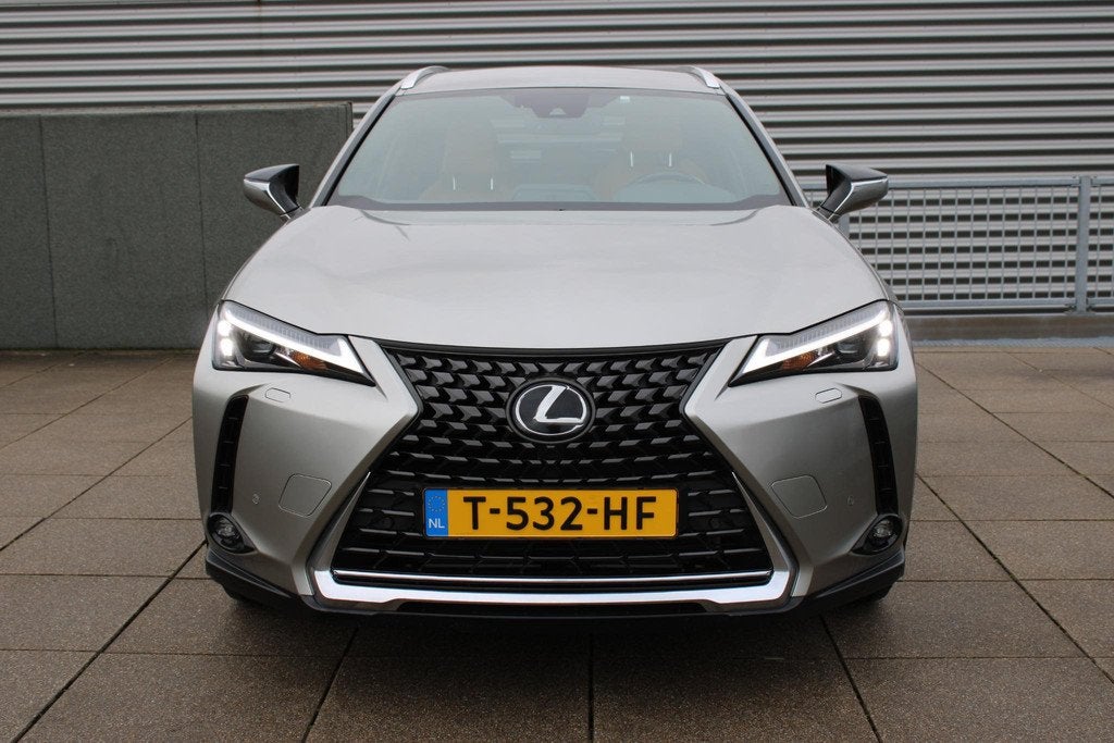 Lexus UX 250h Business Line Hybride 183 pk TREKHAAK / NAVIGA, Stof, Gebruikt, 4 cilinders, Origineel Nederlands
