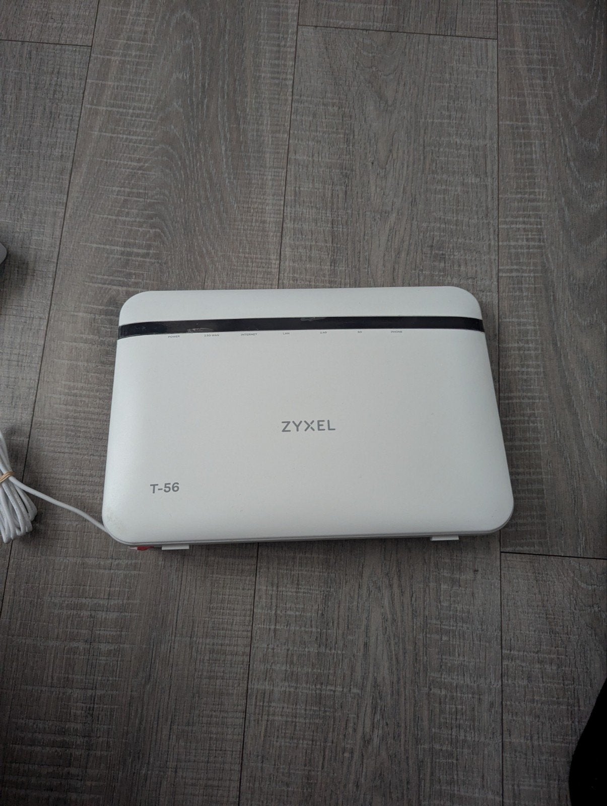 Zyxel T-56 glasvezel Modem Router, Computers en Software, Ophalen of Verzenden, Zo goed als nieuw, Router met modem, Zyxel