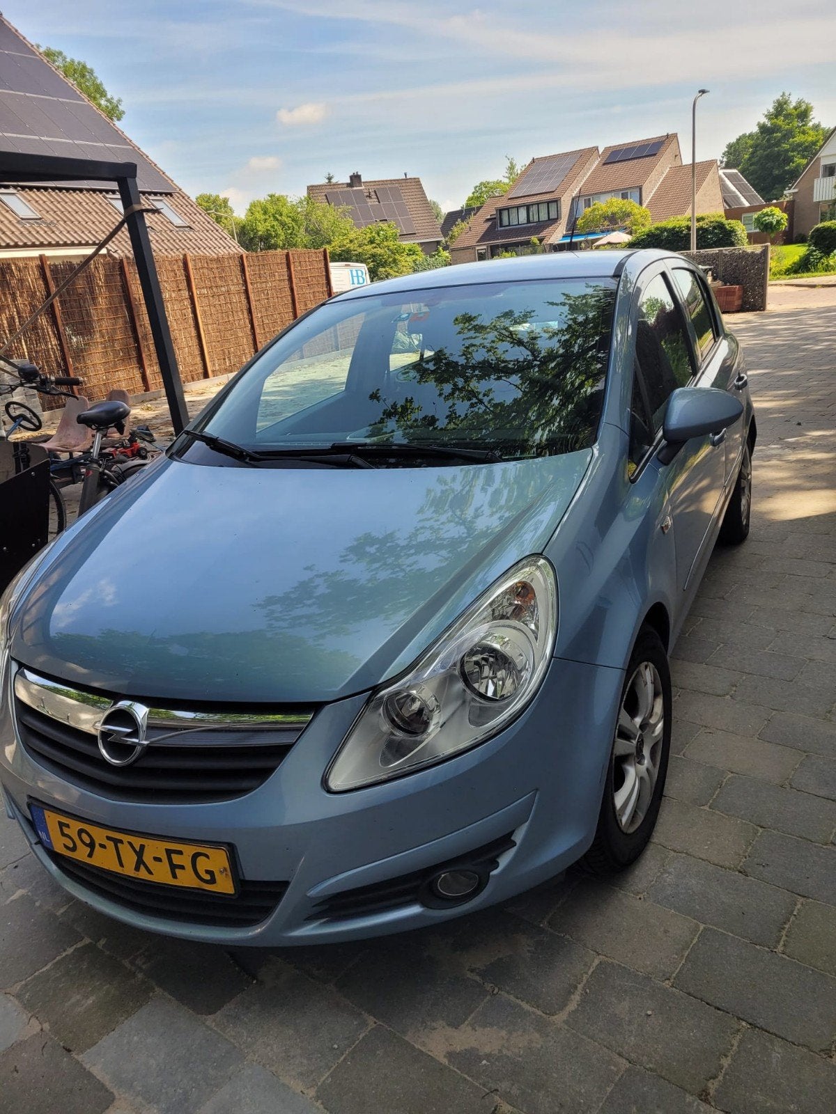 Opel Corsa 1.2 16V 5D WR 2007 Blauw, Auto's, Voorwielaandrijving, Stof, Zwart, 4 cilinders