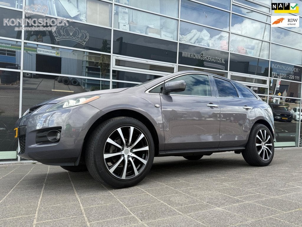 Mazda CX-7 2.3 Turbo Touring Automaat Youngtimer, Auto's, Mazda, Gebruikt, 2261 cc, Zilver of Grijs, 102 €/maand