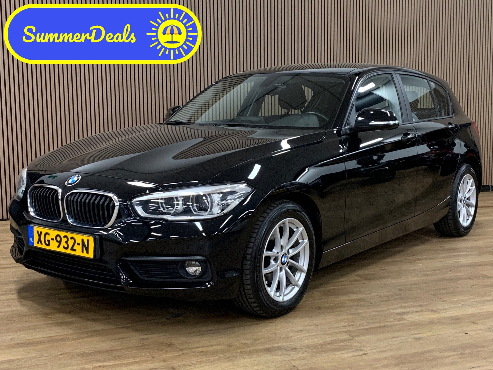 BMW 1-serie 118i Executive|Automaat|Navigatie|Climate Contro, Gebruikt, Zwart, Origineel Nederlands, Bedrijf
