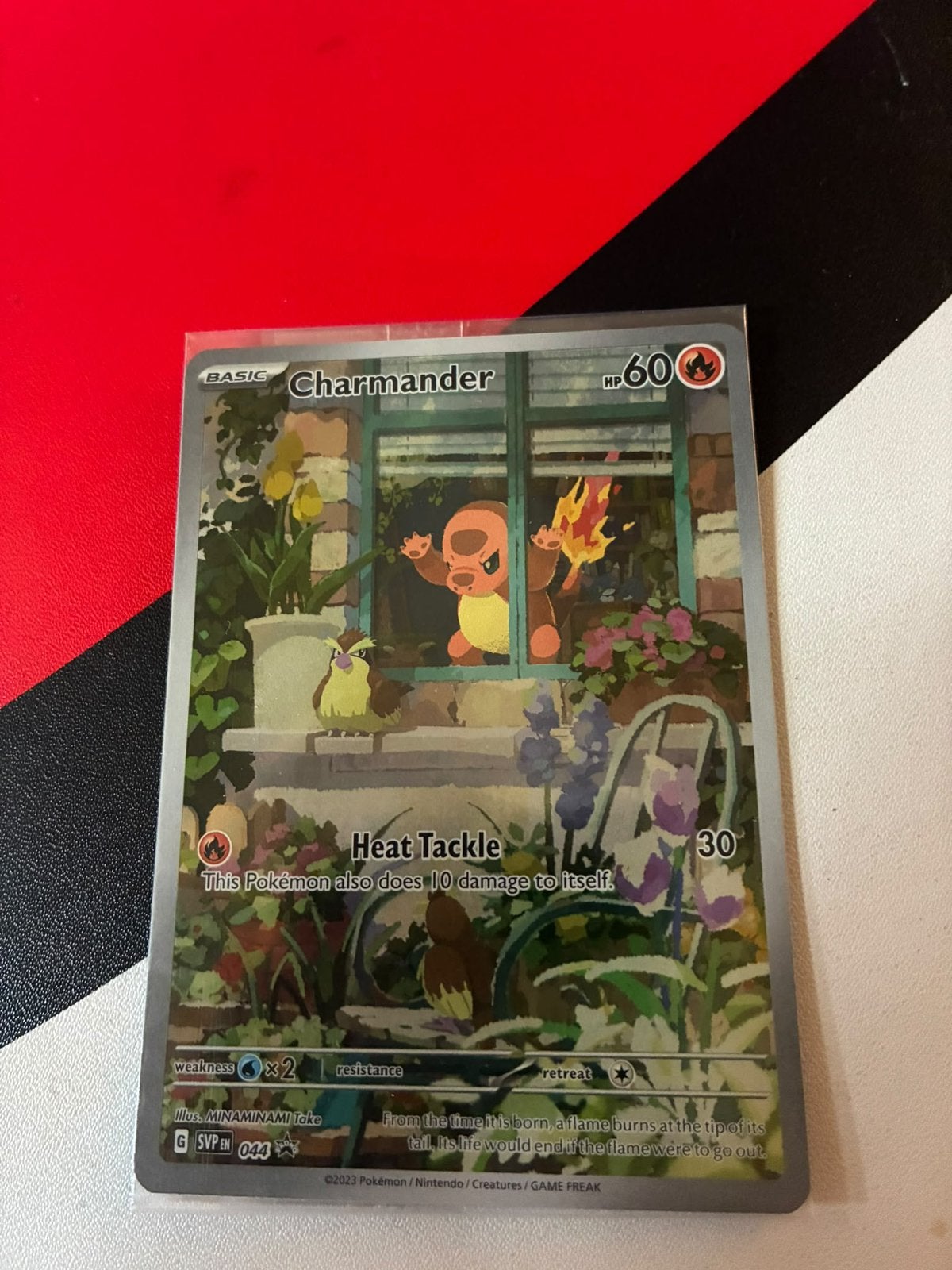 Charmander black star promo 044, Ophalen of Verzenden, Zo goed als nieuw