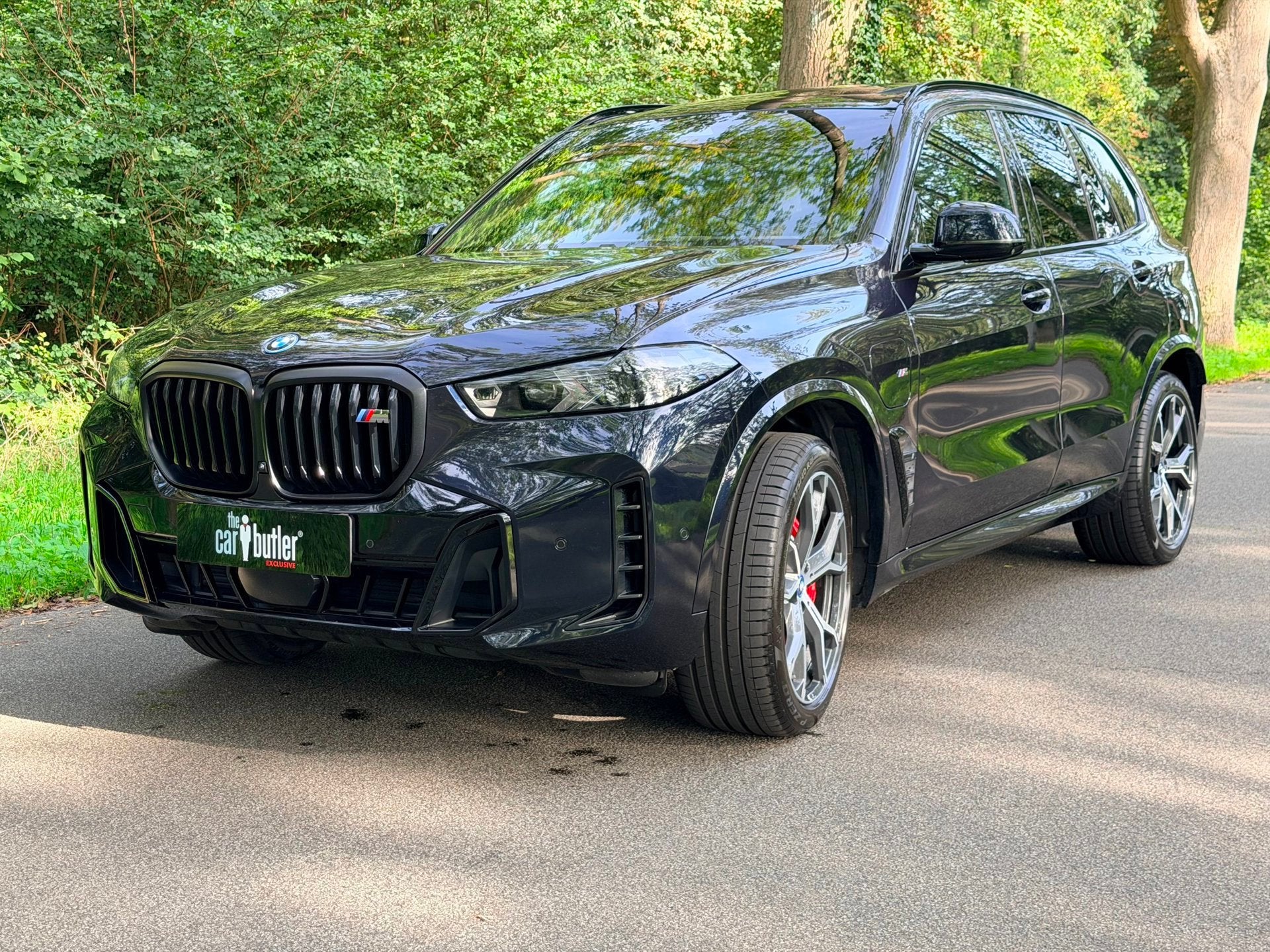 BMW X5 xDrive50e M Sport Pro | Trekhk. | Driving Assist Pro, Dealer onderhouden, Gebruikt, 2395 kg, Zwart