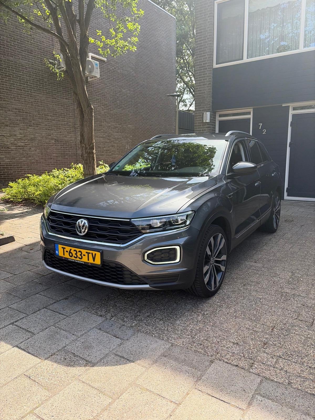 Volkswagen T-Roc 1.5 TSI 150pk 7-DSG 2019 Grijs, Auto's, 1498 cc, 4 cilinders, Particulier, 1500 kg