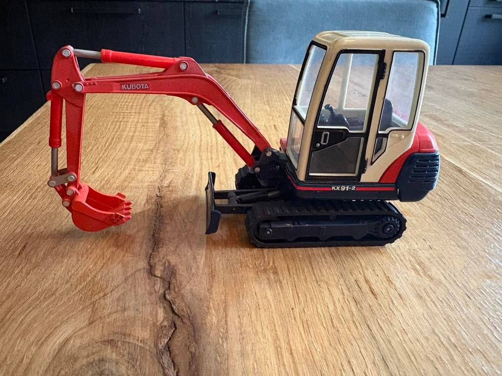Kubota 1/25 mini graver K030-01 Kubota KX91-2, Ophalen of Verzenden, Zo goed als nieuw, Overige merken