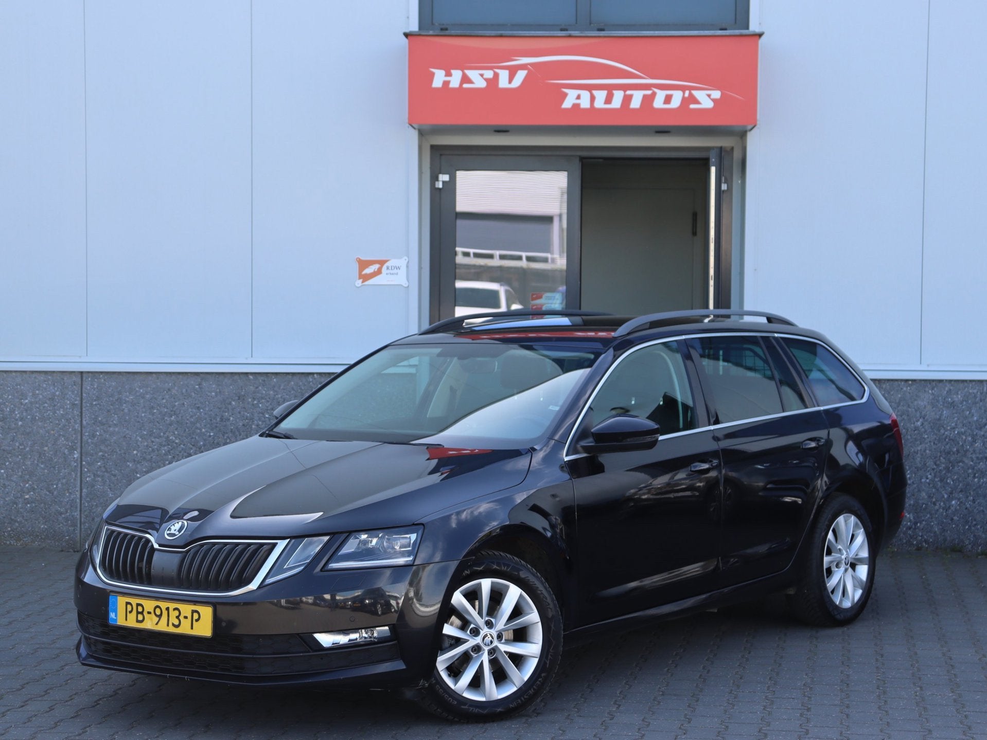 Skoda Octavia Combi 1.6 TDI Greentech Ambition Business navi, Auto's, Gebruikt, Euro 6, 4 cilinders, 116 pk