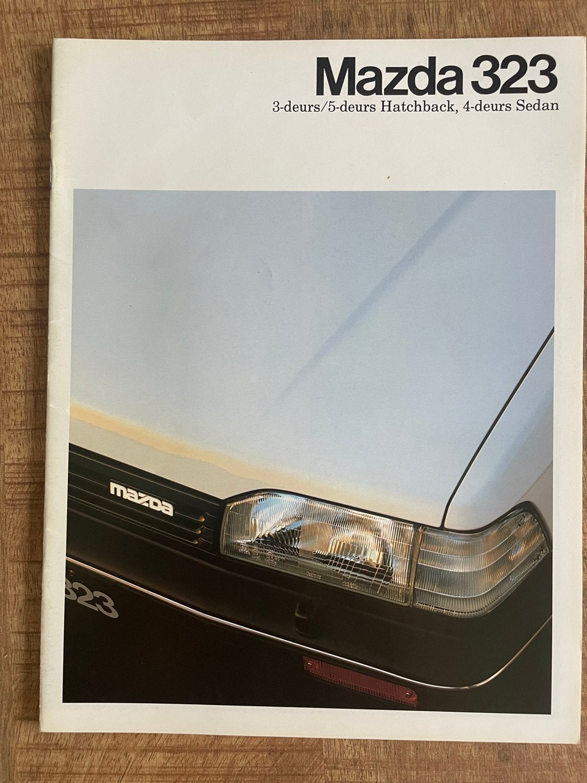 Mazda 323 Brochure (1987), Boeken, Auto's | Folders en Tijdschriften, Ophalen of Verzenden, Zo goed als nieuw, Mazda