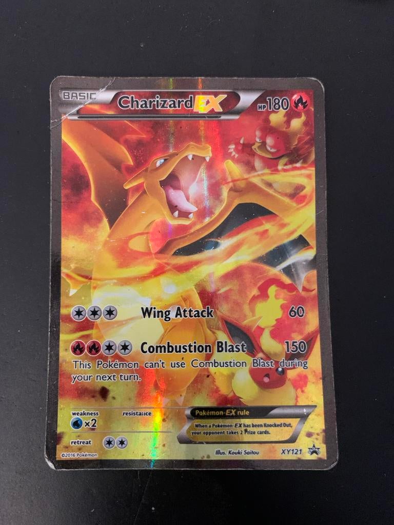 Charizard EX Pokémon kaart XY121 - Beschadigd, Ophalen of Verzenden, Gebruikt, Losse kaart, Foil