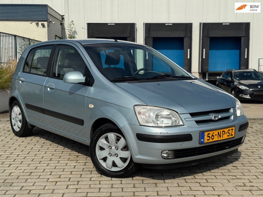 Hyundai Getz 1.3i GLS AUTOMAAT AIRCO APK 5-DRS, Auto's, 4 cilinders, Blauw, Bedrijf, Grijs